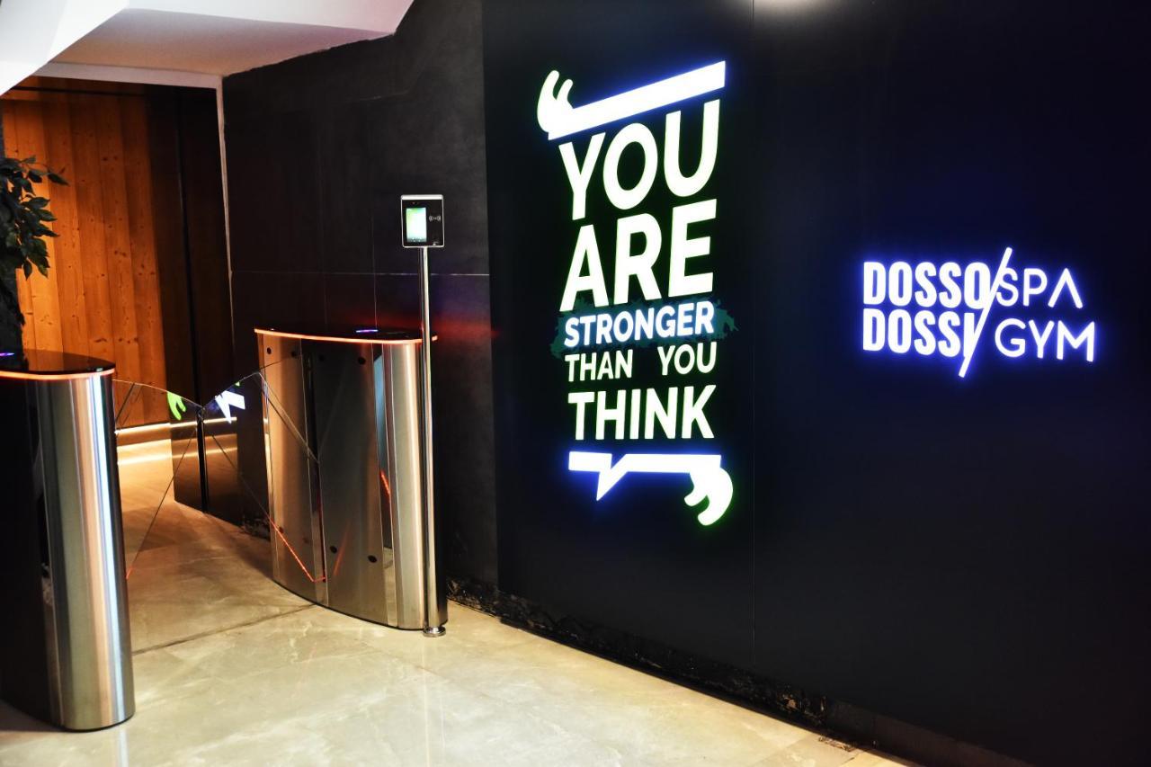 Dosso Dossi Hotels & Spa Downtown Istanbul Ngoại thất bức ảnh The photo shows an entrance area with a modern design, featuring a wall with motivational text that reads "YOU ARE STRONGER THAN YOU THINK." This text is visually striking and designed to encourage individuals. On the adjacent wall, there is a sign t