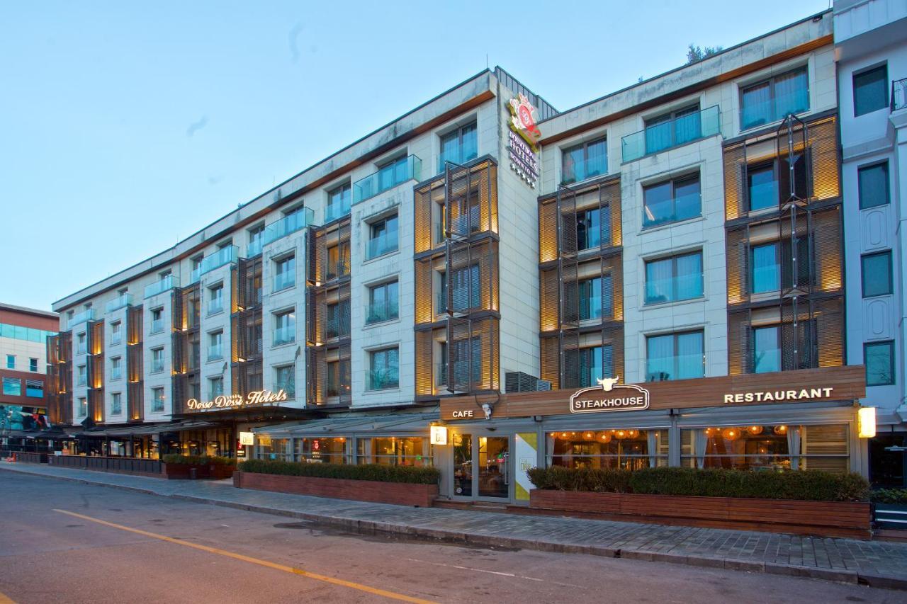 Dosso Dossi Hotels & Spa Downtown Istanbul Ngoại thất bức ảnh The photo shows a modern hotel building with multiple stories. The façade features a mix of glass and concrete elements, giving it a sleek and contemporary look. There are several large windows across the building, allowing for plenty of natural ligh